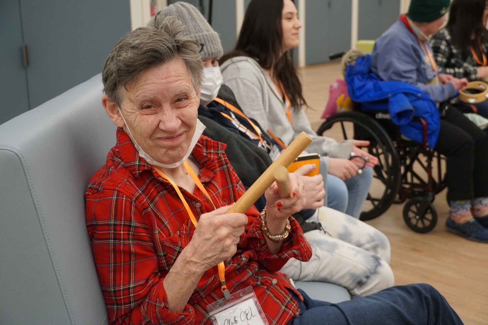 A CEL member smiling and jamming out to music during Friday Night Music.