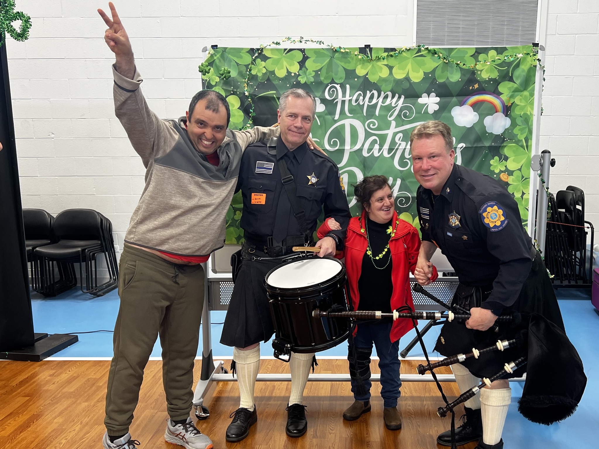 CEL members at St. Patrick's Parade with Chicago Garda Pipes & Drums volunteers.